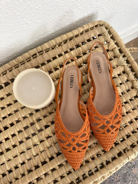 Sandalia destalonada trenzada en naranja
